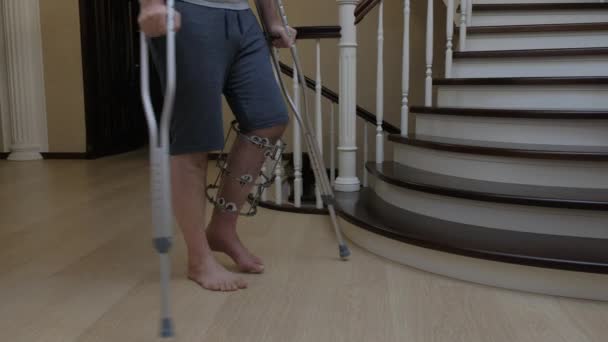 Climbing Stairs Crutches Broken Leg Ilizarov External Fixator — Stock Video