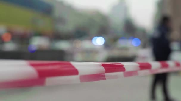 Police barrier : warning police tape at the crime scene. — Stock Video