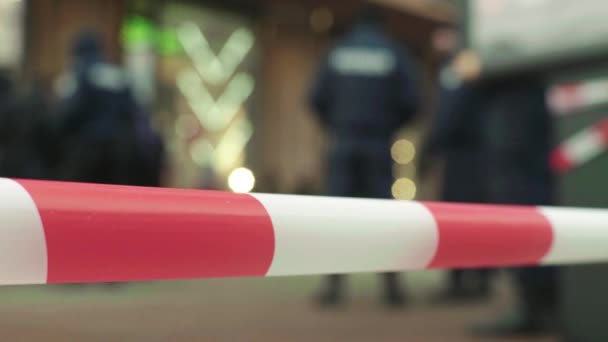 Police barrier : warning police tape at the crime scene. — Stock Video