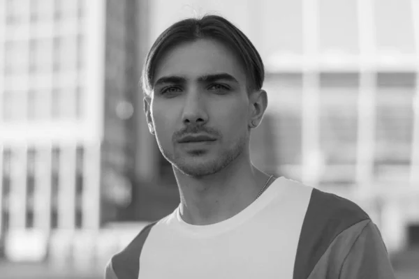 Portrait of a gay man - member of the LGBTQ community. Black and white photo. BW