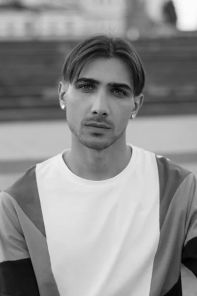 Portrait of a gay man - member of the LGBTQ community. Black and white photo. BW