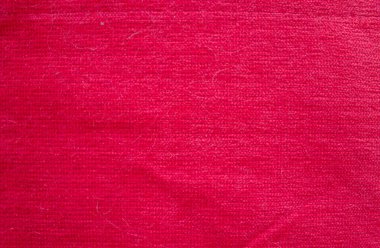 Kırmızı mobilya kumaşının dokusu. Kumaş arkaplanı.