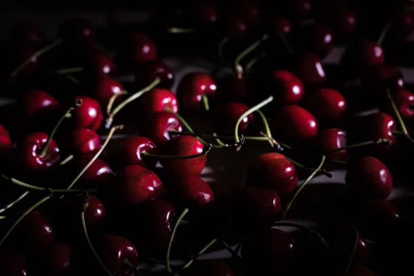 DELICIOUS RED CHERRY ON THE FLOOR