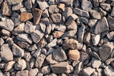 Soyut bir arka plan olarak taş moloz ve çakıl closeup