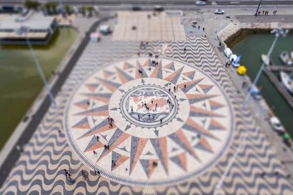 The wind rose on the square of the monument to the discoveries in Lisbon in tilt-shift