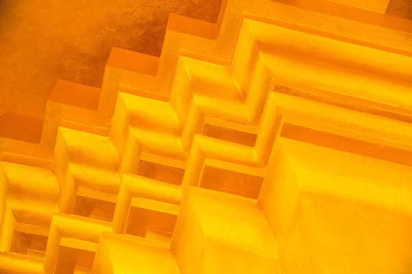 Alçı duvarların altın arka planı.