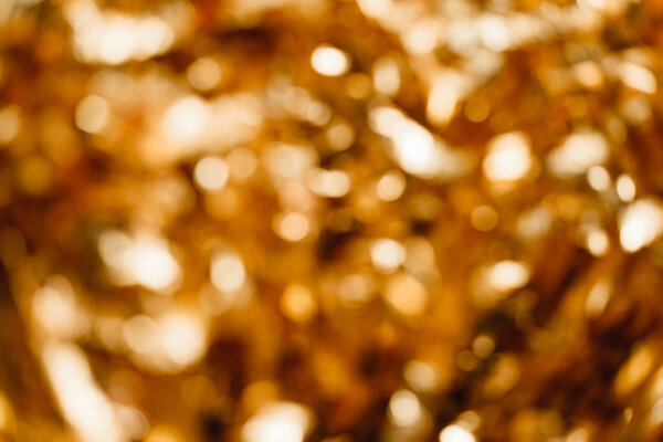 gold background out of focus. Rain foil