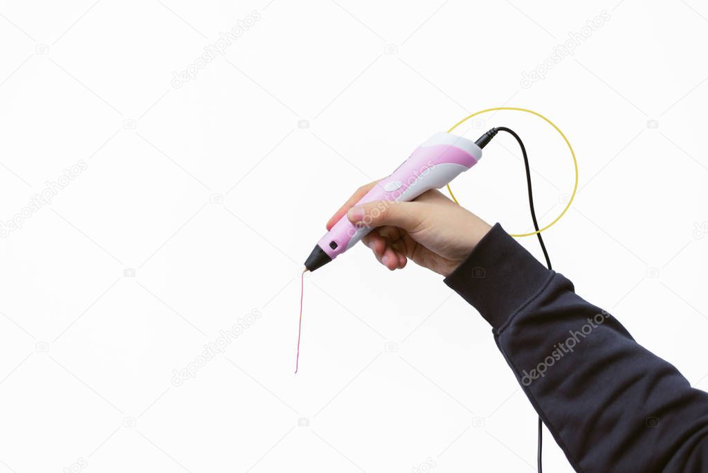 3d handle (pen) in man's hand on white background. 3d paintings and figures with their own hands. teaching children new technologies. Pen cable. 