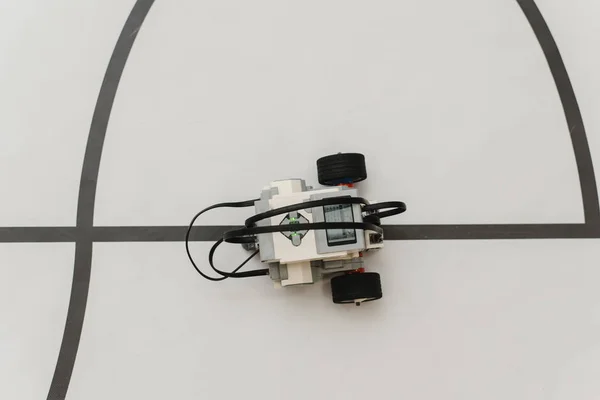 robot drives along a field trajectory. Kids make a robot