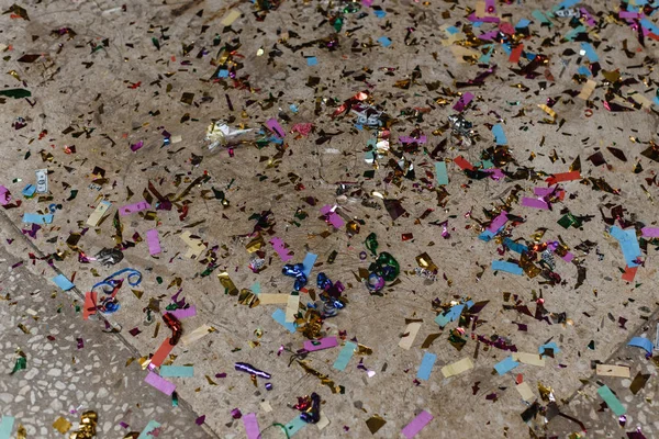 Christmas crackers. after the holiday. Remains of crackers on the floor.