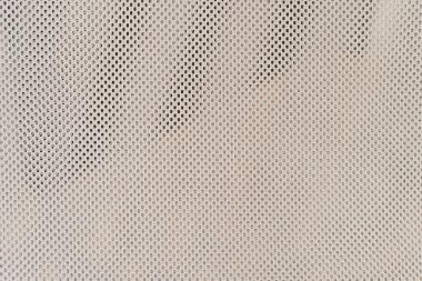 hafif örgü. İnce bir ızgaradan buruşuk ışık arka planı. Küçük kareler.