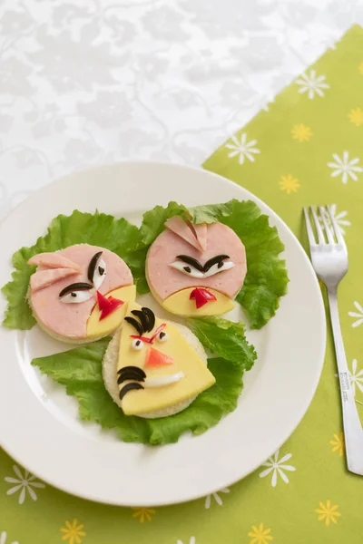 children\'s food, funny bird-shaped sandwiches.