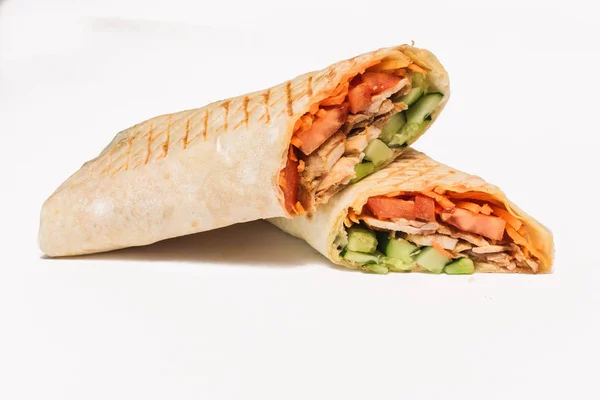 Isolated shawarma with a shadow. Oriental food made from chicken meat, tomatoes, cucumbers in pita bread — Stock Photo, Image