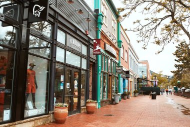 Boulder, Colorado - May 27th, 2020:  Shops, businesses and restaurants along Pearl Street Mall, a pedestrian mall in Boulder County.   clipart