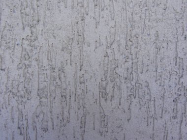 dark striated stucco wall texture