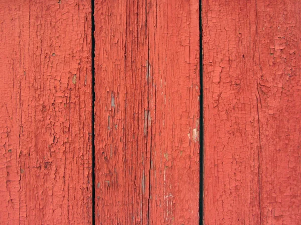 Vägg från träplankor med spår av färg — Stockfoto