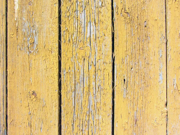 Ściana z drewnianych desek z pomarańczowymi śladami farby — Zdjęcie stockowe