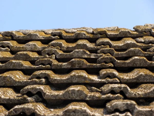 Old aged vintage retro clay shingle tiles on a roof. — Stock Photo, Image