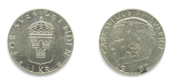 Svenska 1 kronor (krona, kronor) 1982 års mynt. Myntet visar ett porträtt av Sveriges konung Carl XVI Gustaf och Sveriges Riks vapen på fram sidan. — Stockfoto