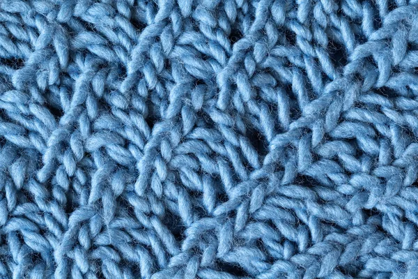 Superficie strutturata in lana lavorata a maglia, macro. Morbido sfondo grigio lana merino blu, primo piano. Autunno e inverno posa piatta. Stile minimal scandinavo — Foto Stock