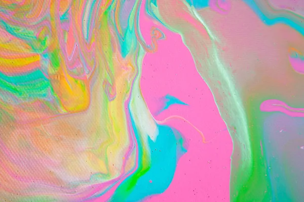 Painting in bright pastel colors using liquid fluid art trendy technique. Flat lay. Close-up. Concept contemporary art accessible to everyone. Horizontal