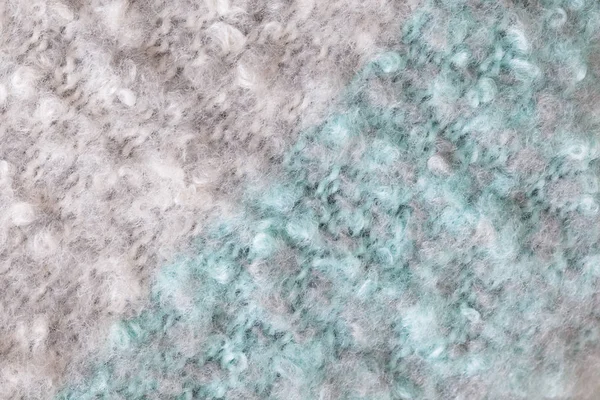 Yünlü kabarık bukle eşarp, makro. Yumuşak pastel renkler merinos yün fon, closeup. Sonbahar ve kış düz yatıyordu. İskandinav minimal tarzı — Stok fotoğraf