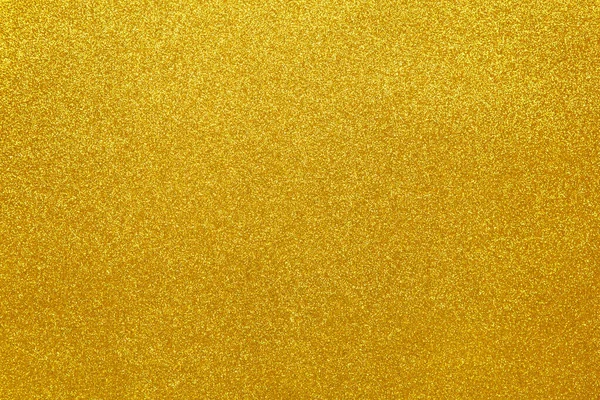 Gold sparkling festive background, close-up. Copy space for text. Horizontal. Celebration, holidays, sales, fashion concept, harvesting for mock up. Top view