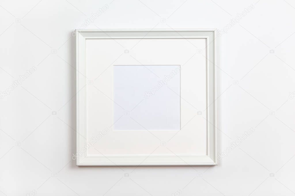 White clean square frame with passepartout on white background, copy space. Flat lay or side view, minimal style mock-up. For gift shop, social media, website design