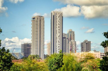 Rishon Lezion ve Bat Yam İsrail sınırında çorak Park Hayam yaşam kuleleri bir dizi oluşur modern geliştirme projesi için iddia ediliyor. Fener kulesi 46 katlı yaşam karmaşık olduğuna arkasında arka plan yapıldı.