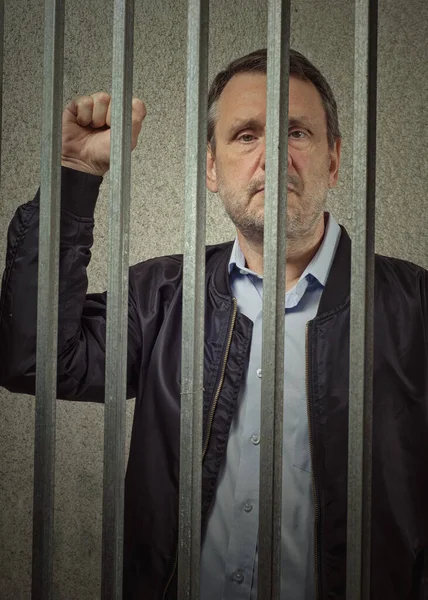 Arrested Left Political Leader Shows Clenched Fist Bars Prison Cell — Stock Photo, Image
