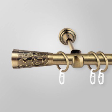 Gri arka plan üzerinde antik desenli dekoratif metal fişli perde saçajlar
