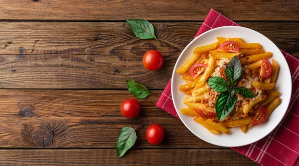 Plate Fresh Bolognese Pasta Tomatoes Basil Leaves Towel Wooden Table — Stock Photo, Image