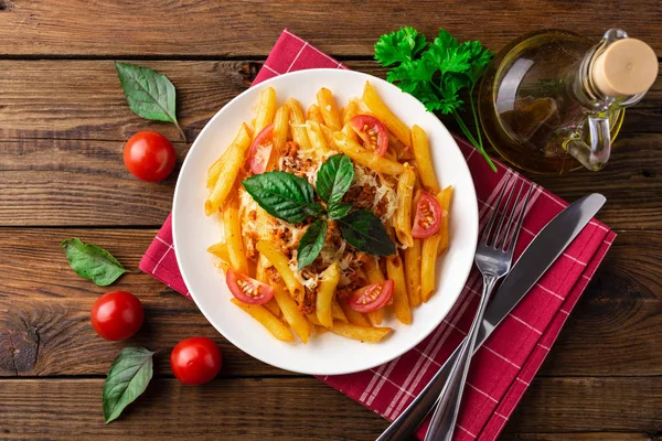 Plate Fresh Bolognese Pasta Tomatoes Basil Leaves Towel Wooden Table — Stock Photo, Image