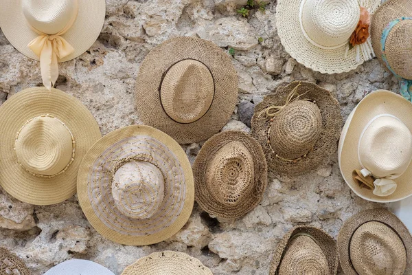 Various straw hats on wall in Ravello, Amalfi Coast, Italy