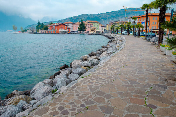 Scenic rocky waterfront on lake Garda, Riva del Garda, Italy, Europe
