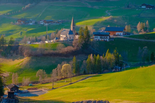 Mountain village scenery in green valley of South Tyrol, Italy, Europe