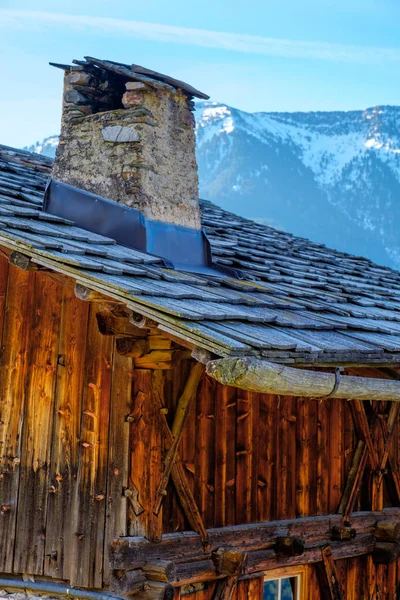 Traditional mountain village hut in scenic mountains of Dolomites, Italy