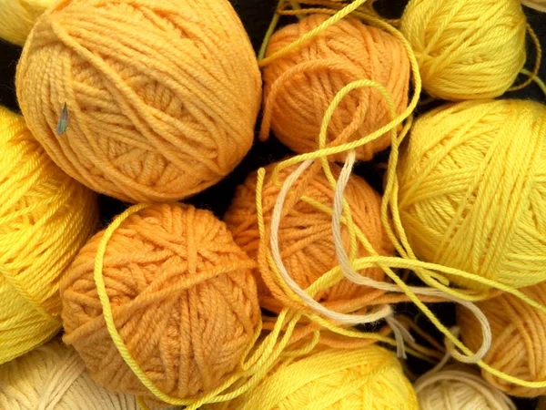 Ball of yellow thread
