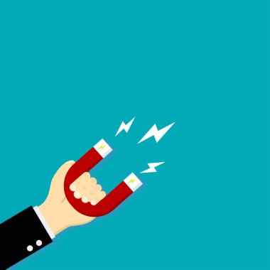 Beyaz yıldırım ile kırmızı mıknatıs tutan el Mavi arka planda manyetize.