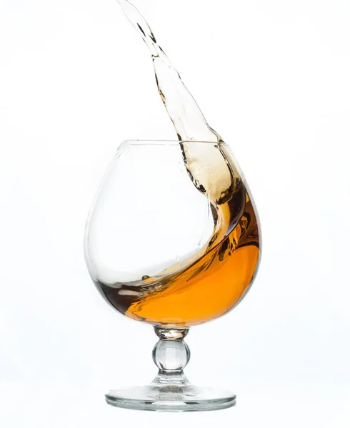 Splash Cognac Transparent Glass Isolated White Royalty Free Stock Images