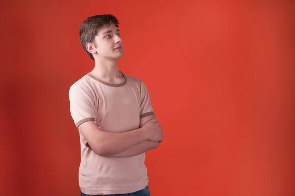 Confident Teenager Beige Shirt Standing Crossed Arms Looking Away Orange — Stock Photo, Image