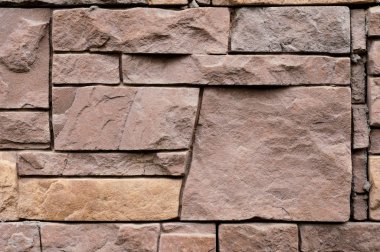 kahverengi ve bej dokulu arka plan ve tuğla taşlarla kopyalama alanı