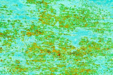 metal yeşil yüzeyüzerinde orpange pas ve derin yatay çizikler ile sorunsuz