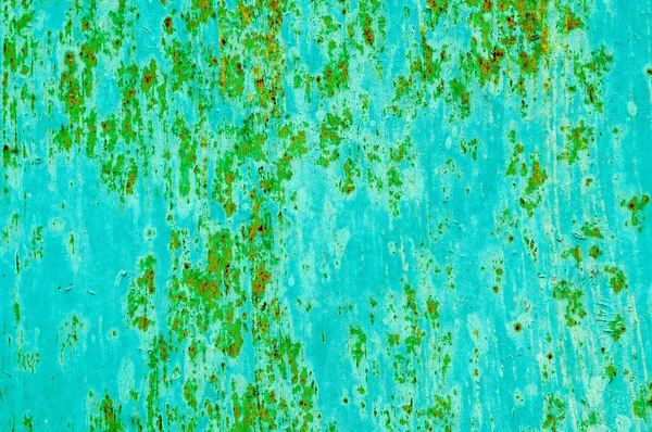metal textured surface painted with green color, with orange rust and scratch marks