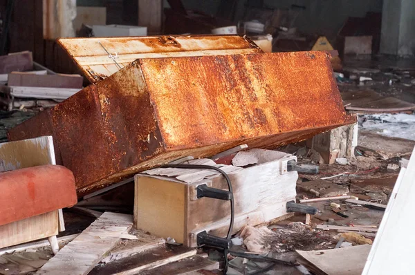 broken furniture in destroyed shop in Pripyt, Chernobyl zone of alienation