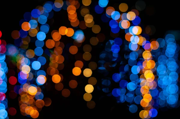 Defocused Θολή Αφρώδη Λαμπερά Χριστουγεννιάτικα Μπλε Και Πορτοκαλί Φώτα Στο — Φωτογραφία Αρχείου