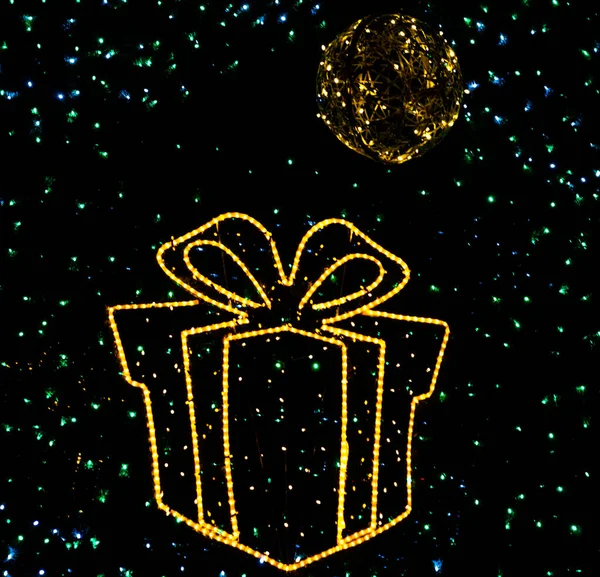 Soft Focus Shiny Yellow Gift Box Christmas Lights Ball Glowing — Stock Photo, Image