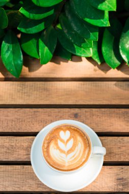 Ahşap masa, yiyecek ve içecek kavramı sanat latte kahve Üstten Görünüm