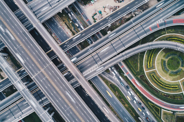 Intersection cross traffic city road with vehicle transport aerial view