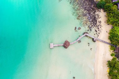 Tropical white sand bech with coconut palm tree background idyllic turquoise sea aerial view